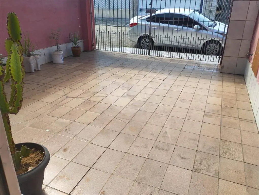 Casa Térrea para Venda em Praia Grande, Vila Guilhermina, 2 dormitórios, 1 banheiro, 2 vagas
