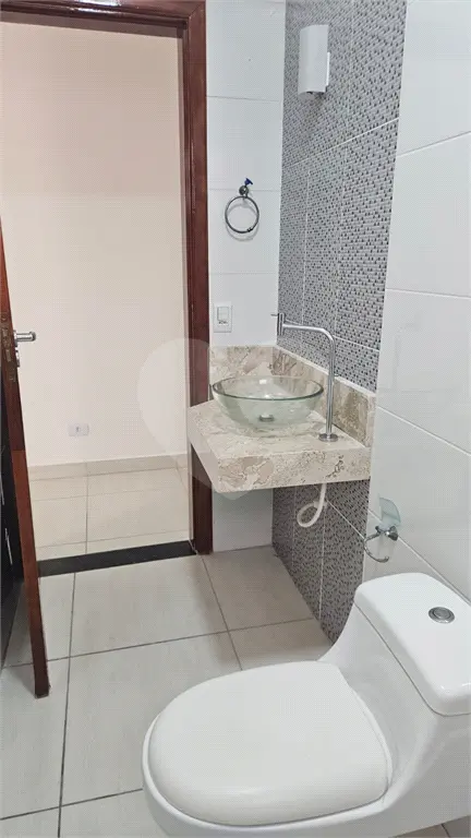 Sobrado para Venda em Praia Grande, Vila Guilhermina, 3 dormitórios, 2 suítes, 2 banheiros, 2 vagas