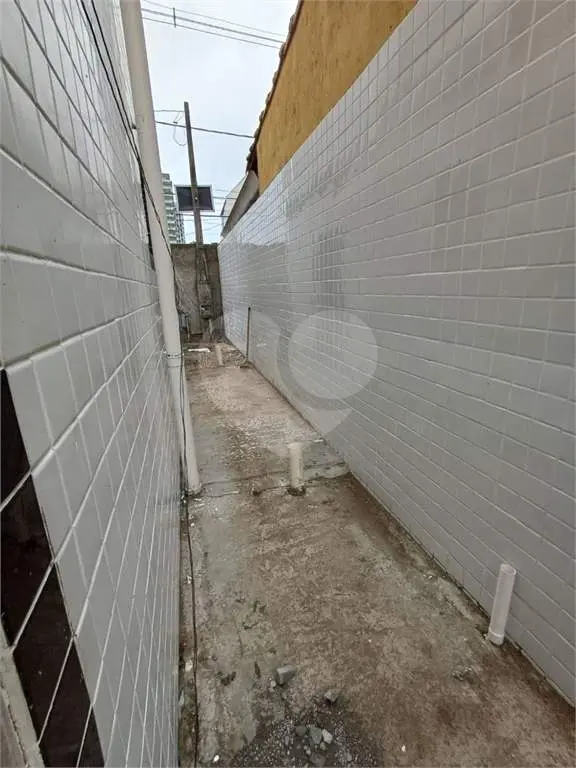 Sobrado para Venda em Praia Grande, Guilhermina, 3 dormitórios, 3 suítes, 1 banheiro, 2 vagas
